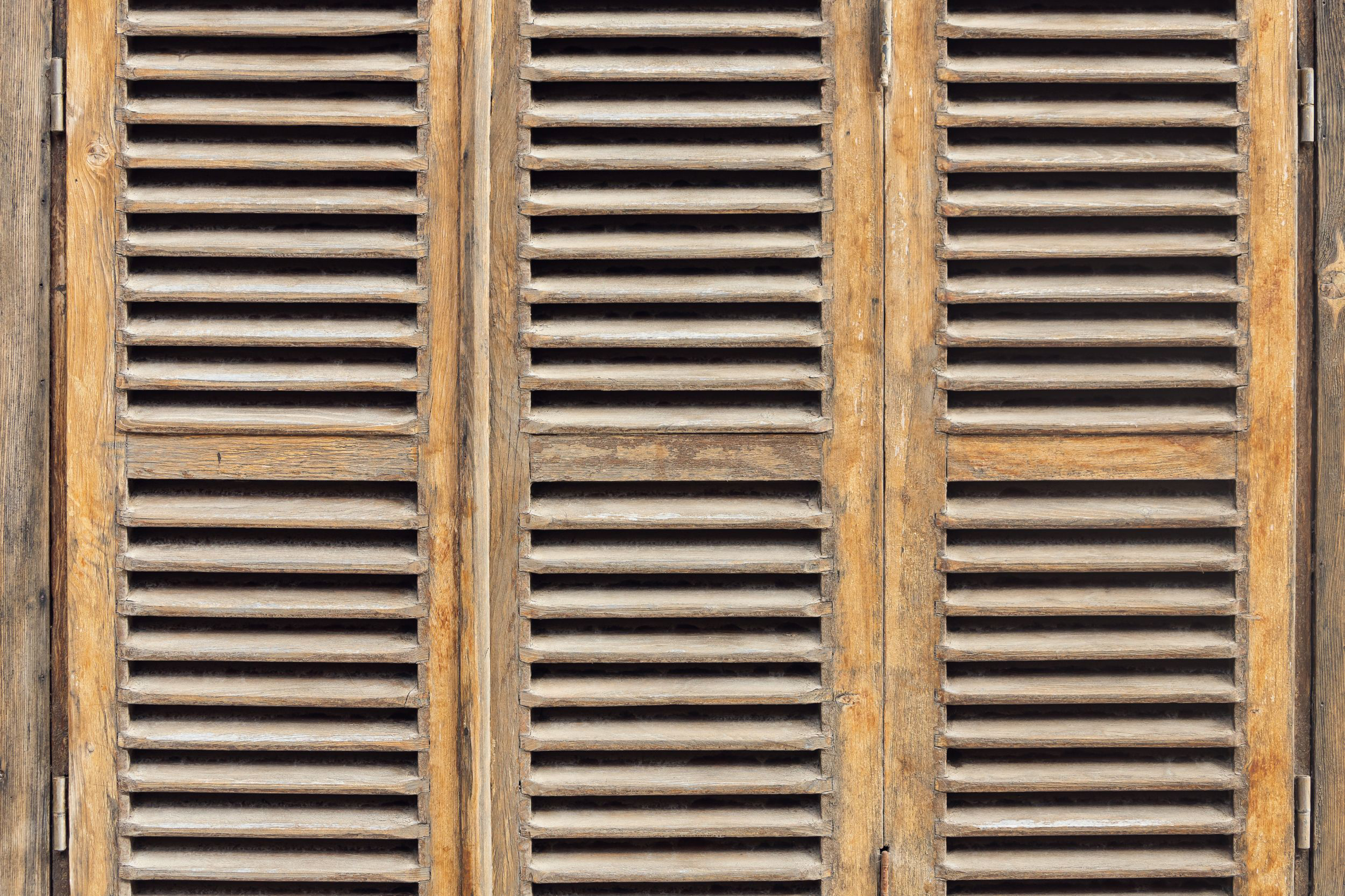 close-up-brown-wooden-vintage-window-old-stone-house copy